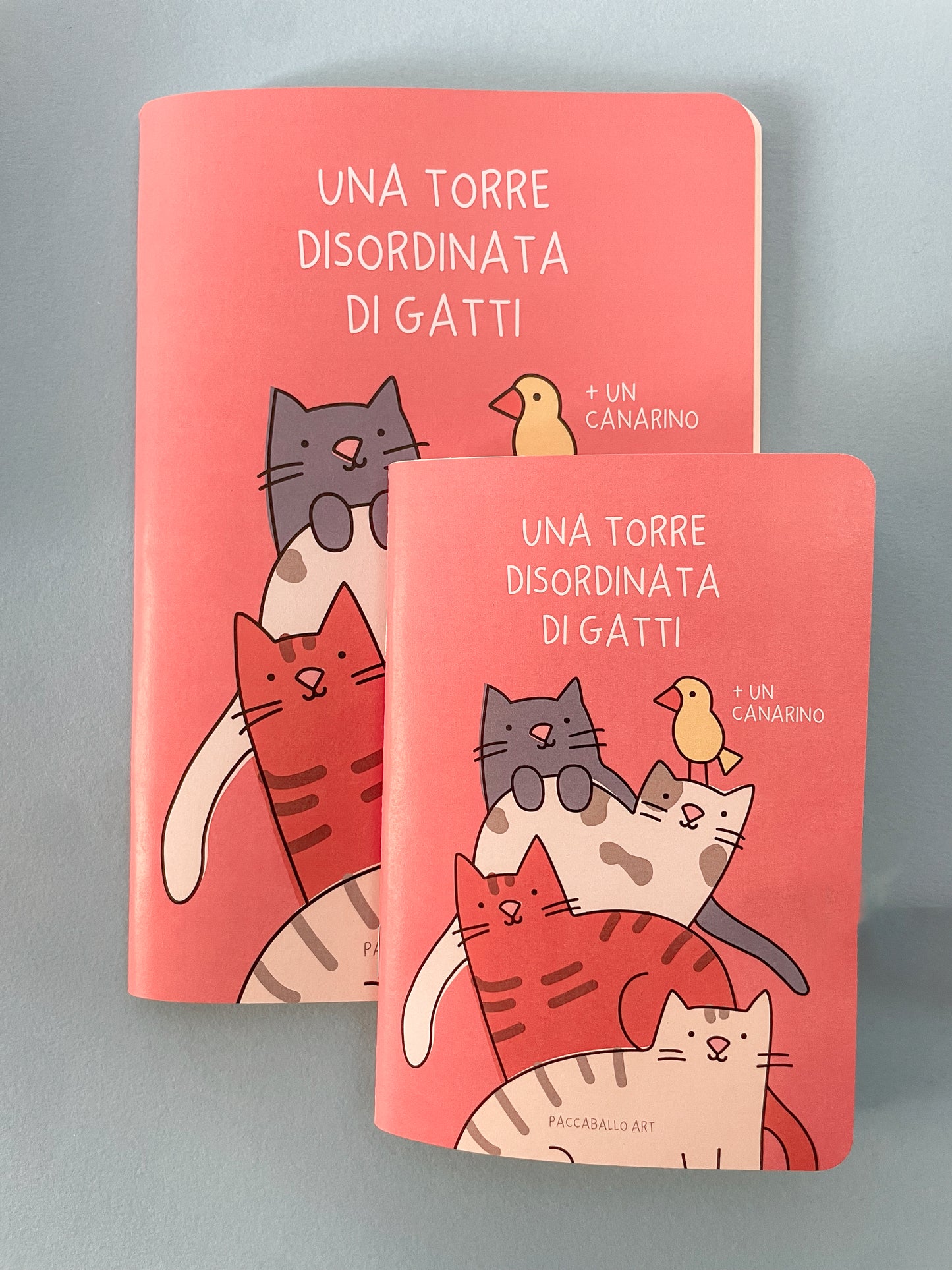 Quadernino - Una torre disordinata di gatti